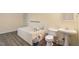 Bright bathroom featuring a large soaking tub, toilet, and sink at 2321 Mica Mine Ln, Wake Forest, NC 27587