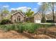 Beautiful brick home with a well-manicured front lawn and flowerbeds at 2321 Mica Mine Ln, Wake Forest, NC 27587