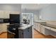 Well-appointed kitchen featuring granite counters and a cooking island at 2321 Mica Mine Ln, Wake Forest, NC 27587