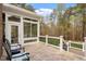 Beautiful tiled patio featuring outdoor seating and offering a seamless transition to the indoors at 2321 Mica Mine Ln, Wake Forest, NC 27587