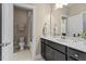 Bathroom with a modern vanity, framed mirror, recessed lights, and stylish fixtures at 2421 Trenton Park Ln, Raleigh, NC 27607