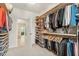 Walk-in closet with custom shelving for optimal storage and organization at 2421 Trenton Park Ln, Raleigh, NC 27607