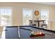 Game room featuring a pool table, billiard accessories and natural light coming from the windows at 2421 Trenton Park Ln, Raleigh, NC 27607