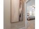 Hallway view featuring a large painting and entry to a bedroom at 2421 Trenton Park Ln, Raleigh, NC 27607