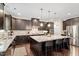 Spacious kitchen features granite countertops, stainless steel appliances, and a large center island with seating at 2421 Trenton Park Ln, Raleigh, NC 27607