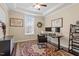 Inviting office with a ceiling fan, map art, and a window offering natural light at 2421 Trenton Park Ln, Raleigh, NC 27607