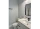 Stylish bathroom featuring modern fixtures, vanity with quartz counters, and shower with accent tiles at 245 Marilyn Cir, Cary, NC 27513