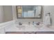 Elegant bathroom with double sinks, granite countertop, and stylish fixtures at 2540 Levi Ln, Bahama, NC 27503