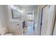 Bathroom with a sleek, modern vanity, open doorway, and separate shower and tub at 2540 Levi Ln, Bahama, NC 27503