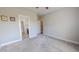 Spacious bedroom with ensuite and neutral tones, featuring carpeted floors and ample natural light at 2540 Levi Ln, Bahama, NC 27503