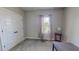 Comfortable bedroom featuring a double closet and a large window with natural light at 2540 Levi Ln, Bahama, NC 27503