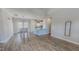 Open floor plan with eat-in kitchen, hardwood floors, and modern accents at 2540 Levi Ln, Bahama, NC 27503