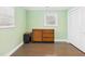 Bright bedroom features hardwood floors, natural light, and ample closet space at 2920 Ode Turner Rd, Hillsborough, NC 27278