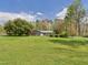 Charming one-story home with a well maintained lawn and mature trees at 2920 Ode Turner Rd, Hillsborough, NC 27278