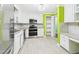 Updated kitchen featuring stainless appliances, marble counters, and white cabinets at 2920 Ode Turner Rd, Hillsborough, NC 27278