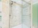 Close-up of newly remodeled tile shower with updated shower head at 2920 Ode Turner Rd, Hillsborough, NC 27278