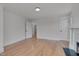 Spacious bedroom with hardwood floors, white trim, and neutral paint at 301 E Umstead St, Durham, NC 27707