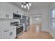 Well-equipped kitchen featuring stainless steel appliances and an open concept design at 301 E Umstead St, Durham, NC 27707