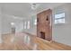 Beautiful living room featuring a brick fireplace and hardwood floors at 301 E Umstead St, Durham, NC 27707