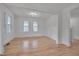 Spacious living room featuring hardwood floors and an open layout, perfect for entertaining at 301 E Umstead St, Durham, NC 27707