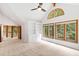 Bright bedroom with multiple windows, vaulted ceiling and built in bookshelves at 301 Stone Currie Dr, Hillsborough, NC 27278