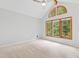 Bedroom has bright natural light, ceiling fan, and multiple windows at 301 Stone Currie Dr, Hillsborough, NC 27278