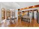 Beautiful kitchen and dining area with a stone-accented island and abundant natural light at 301 Stone Currie Dr, Hillsborough, NC 27278