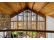 Bright living room with high ceilings, a wall of windows, and natural light at 301 Stone Currie Dr, Hillsborough, NC 27278