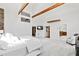 Large main bedroom boasts wood beam accents, vaulted ceiling and ensuite access at 301 Stone Currie Dr, Hillsborough, NC 27278