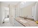 Bathroom with updated vanity, granite countertops and modern fixtures at 3026 Shoeheel Rd, Kenly, NC 27542