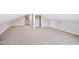 Large bonus room with a finished attic area, perfect for flexible living at 3026 Shoeheel Rd, Kenly, NC 27542