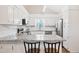 Bright kitchen boasting granite countertops, stainless appliances, and modern cabinetry at 3026 Shoeheel Rd, Kenly, NC 27542