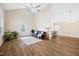 Spacious living room featuring vaulted ceilings, hardwood floors, and bright natural light at 3026 Shoeheel Rd, Kenly, NC 27542