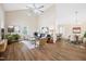 Nicely staged living room featuring vaulted ceilings, hardwood floors, and bright natural light at 3026 Shoeheel Rd, Kenly, NC 27542
