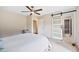 Spacious main bedroom with ensuite bath featuring a glass shower and modern sliding door at 3026 Shoeheel Rd, Kenly, NC 27542