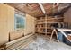 Spacious storage area with shelving and a large window for natural light at 3026 Shoeheel Rd, Kenly, NC 27542
