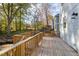 Expansive wooden deck with railings, ideal for outdoor entertaining and relaxation at 306 Cecil St, Durham, NC 27707