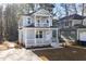Charming two-story home with a welcoming front porch and upper level balcony at 306 Cecil St, Durham, NC 27707