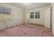 Bedroom with pink carpet, and two windows allowing ample natural light at 3416 North Ridge Dr, Sanford, NC 27330
