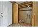 The laundry room featuring shelves, wood paneling walls, and washer connections at 3416 North Ridge Dr, Sanford, NC 27330