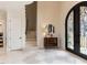 Elegant foyer featuring marble floors, a grand staircase, and an ornate iron door, setting a luxurious tone at 3505 Jonaway Cir, Fuquay Varina, NC 27526