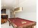 Well-lit game room with pool table, wet bar, and comfortable seating at 3505 Jonaway Cir, Fuquay Varina, NC 27526