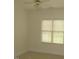 Well-lit bedroom with carpet, ceiling fan and a double window covered with blinds at 3537 Layton Ridge Dr, Apex, NC 27539