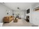 Staged living room featuring a fireplace, comfortable seating, and stylish decor at 408 Indian Elm Ln, Cary, NC 27519