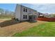 The backyard has a screened-in patio and is surrounded by a wooden fence at 433 Mockingbird Ln, Mebane, NC 27302