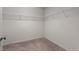Walk-in closet with carpet and wire shelving at 433 Mockingbird Ln, Mebane, NC 27302