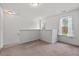 The loft has a small window on each side and carpet at 433 Mockingbird Ln, Mebane, NC 27302