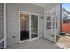 A patio has a door to the house and a screened-in portion at 433 Mockingbird Ln, Mebane, NC 27302