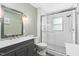 Well-lit bathroom with white subway tile shower and contemporary fixtures at 440 S Church St, Coats, NC 27521