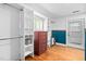 Spacious walk-in closet featuring built-in shelving and plenty of storage options at 440 S Church St, Coats, NC 27521